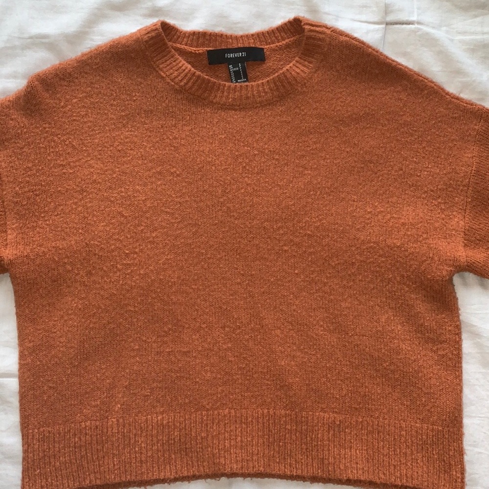 orange-brown long sleeve shirt